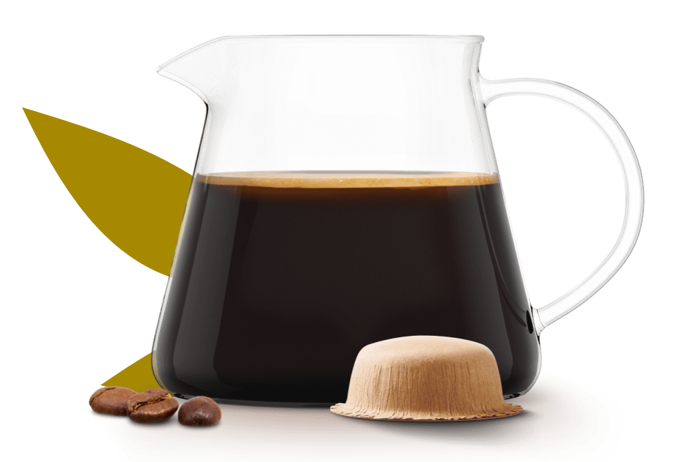 een volle karaf koffie naast een NEO pad